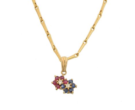 A vari gem floral pendant, the diamond, ruby and sapphire double floral cluster pendant suspended from a fancy link chain sta