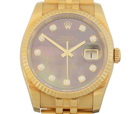 An 18ct gold Rolex Oyster Perpetual Datejust wristwatch, circa 2011-21, the circular signed black mother of pearl dial with d