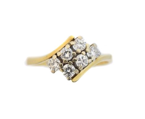 A diamond crossover ring, the brilliant cut diamond cluster with asymetric shoulders, estimated total diamond weight 0.50ct, 