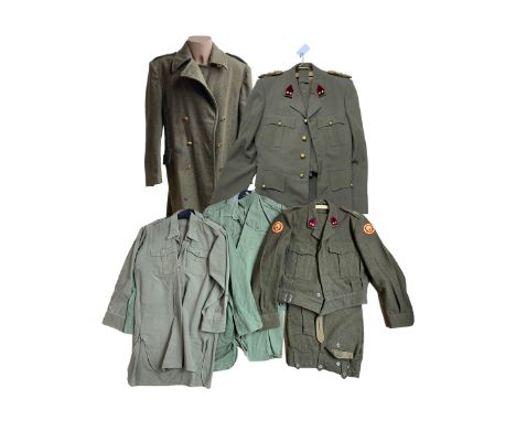 1950s Belgian military uniform including greatcoat, jacket with brass buttons, kit bag, Artillery cap badge and other items a