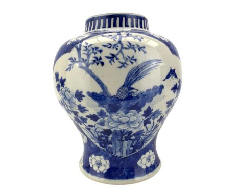 Late 19th century Chinese baluster form jar, painted in underglaze blue with two barbed lobed panels of exotic birds, insects