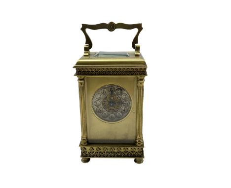 French - Early 20th century 8-day timepiece carriage clock, case with a shaped handle and reeded columns to the corners, plin