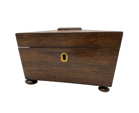 Victorian rosewood sarcophagus form tea caddy, with brass escutcheon, the interior with two lidded cannisters, raised on four