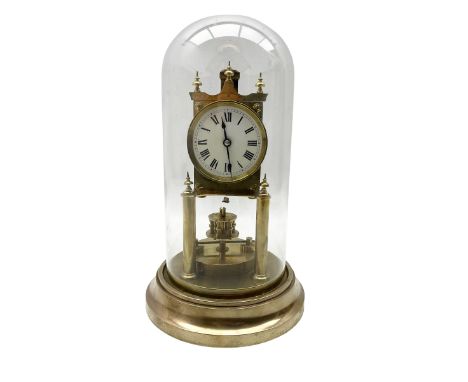 Gustav Becker - early German 20th century brass torsion mantel clock, with a glass dome on a circular brass base, movement an