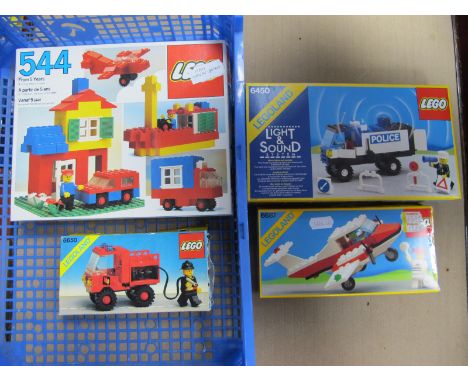 Four Lego Sets, to include #6450 Legoland light and sound mobile Police truck, Lego #544 universal basic building set, all bo
