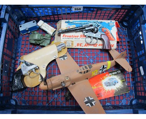 A 'Fly By Wire' Plastic Aircraft, by 'Testors' with engine, a Husky catalogue, two toy cowboy guns, (one boxed) and three die