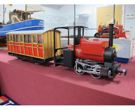 A Modern 'O' Gauge 'Narrow' Gauge 0-4-0 Locomotive and Coach, wooden construction in the style of a 'Mountain' railway engine