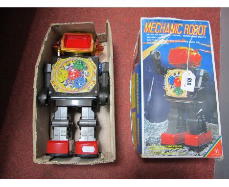 A Japanese Battery Operated Mechanic Robot, black/grey tin plate and plastic body, arms, legs, orange and red plastic head, c