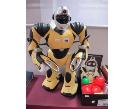 A Robosapien WS8091 by Wowwee, (2005) 22" high plastic toy robot, including controller unit and user manual, untested.