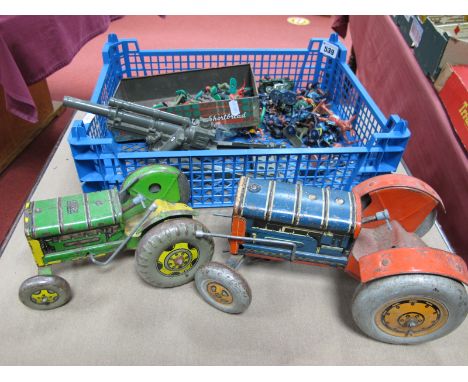 Two 1950's Tinplate Tractors, by Mettoy, a Marx plastic cannon and a quantity of Mid XX Century plastic figures by Timpo and 