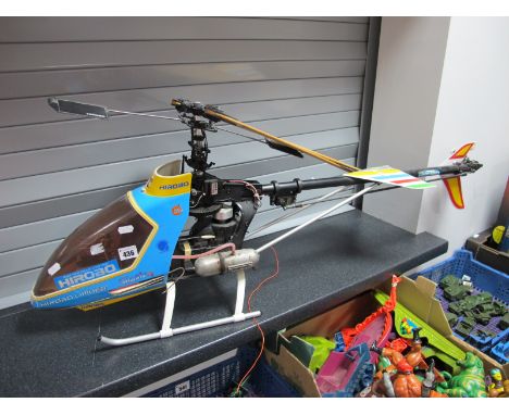 A Radio Controlled Hirobo Shuttle, plus helicopter featuring Futaba S3001 indirect drive, Futaba FP-R138DF eight Channel Rece