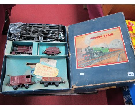 A Post War Hornby "O" Gauge '501' Set, comprising 0-4-0 locomotive and tender, coal wagon and guards van, missing timber wago