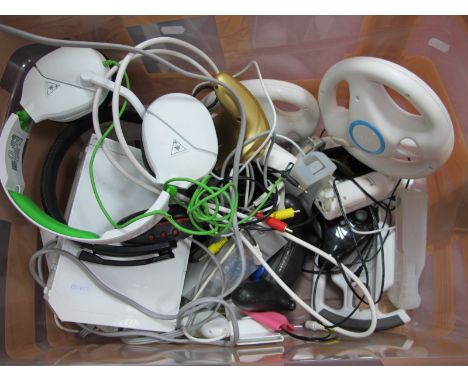 A Quantity of Nintendo WII Gaming Accessories, to include steering wheels, controllers headset, together with one Nintendo WI