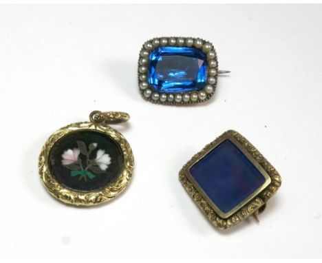 Three 19th century gold jewels, comprising; an early Victorian gold, floral pietra dura and black enamel forget me not memori