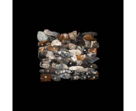 Mainly Mesolithic, 12,000-5,000 BC. A mixed group of knapped flint scrapers and other tools, some retouched, some marked with