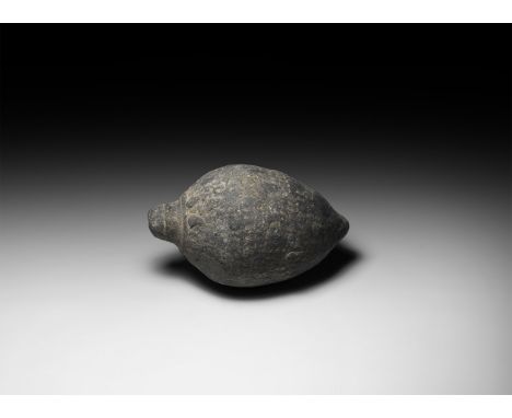 9th-11th century AD. A ceramic bulbous vessel with domed top and flat base, intended to be filled with explosive liquid and w