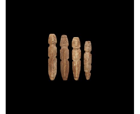 1st millennium AD. A group of four bone idols or dolls, keeled body, ring-and-dot eyes and slit mouth.   19.5 grams total, 61
