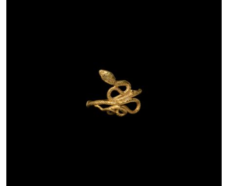 Ptolemaic Period, 332-30 BC. A gold finger ring formed as a snake with coiled tail and neck. Cf. Chadour, A.B., Rings. The Al