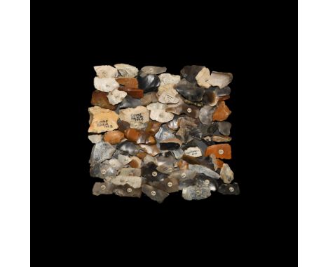Mainly Mesolithic, 12,000-5,000 BC. A mixed group of knapped flint scrapers, burins and other tools, some with inked annotati