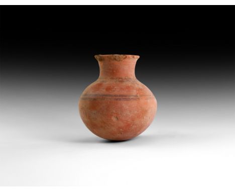 9th-7th century BC. A ceramic vase with bulbous body and rounded underside, trumpet-shaped mouth, concentric painted bands.  