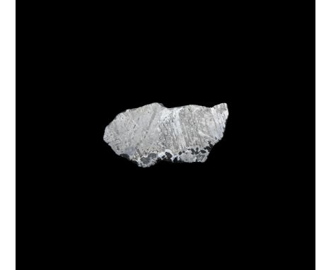 Found June 1967 AD. A highly polished slice of the Seymchan meteorite showing the distinctive Widmanstatten pattern. See Grah