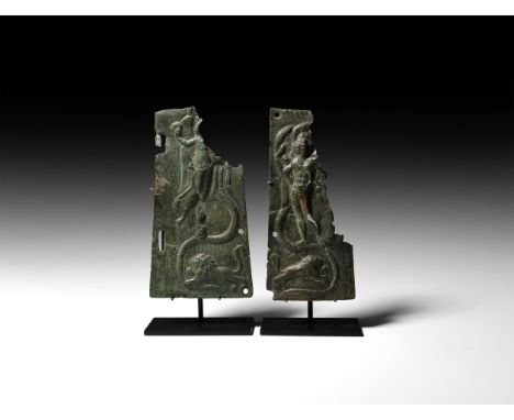 1st-2nd century AD. A pair of sheet bronze trapezoidal figural plaques with repoussé and punched detailing: 1) fragment with 