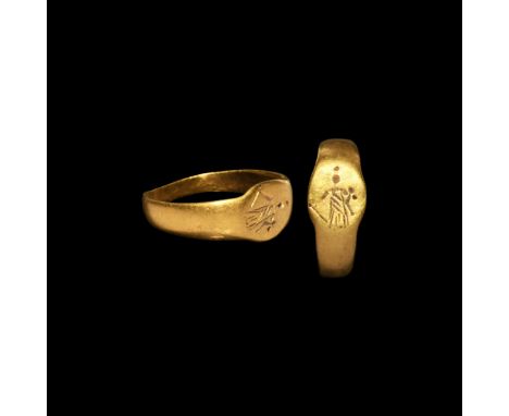 2nd-3rd century AD. A small gold finger ring with disc bezel, intaglio stylised figure of Fortuna (Greek Tyche) with cornucop