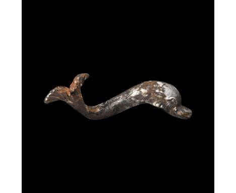 1st-2nd century AD. A large silver mount of a dolphin modelled in the round, expressive eyes, open mouth with separate insert