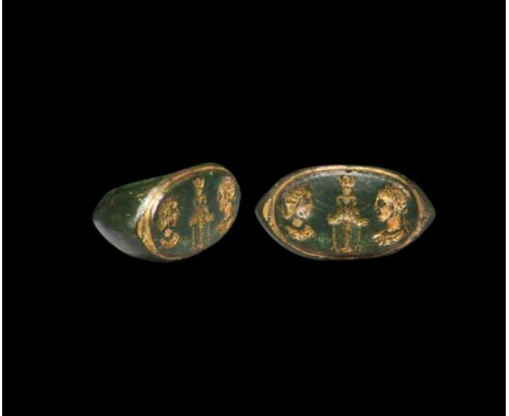 3rd century AD. A substantial gilt bronze ring with thick keeled hoop expanding towards the shoulders, lentoid bezel with rai