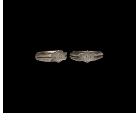 3rd century AD. A silver ring with angled and fluted shoulders, flat bezel engraved with 'FEL' for felix, meaning happy or lu