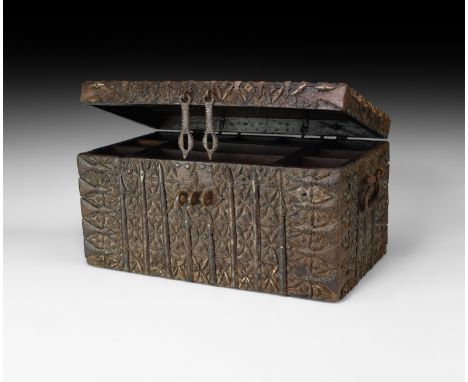 18th-19th century AD. A wooden casket with hinged lid, iron reinforcing straps and plates to the outer faces, two falling han