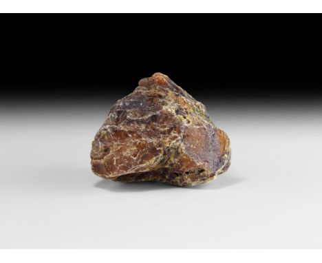 Oligocene Period, 45 million years BP. A large irregular block of natural amber.   607 grams, 13cm (5"). Property of a London