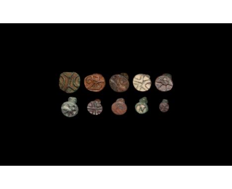 Late 3rd-2nd millennium BC. A mixed group of ten bronze seals with various shapes and designs including eight accompanied by 