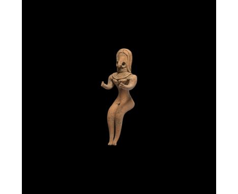 3rd millennium BC. A ceramic fertility figurine with large D-shape head, pinched nose, recessed eyes, multi-strand collars; t