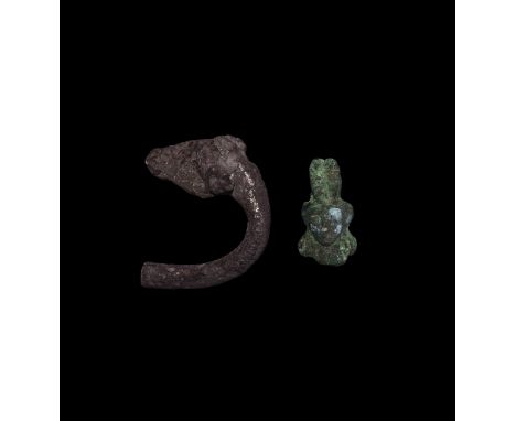 1st millennium BC. A group of two artefacts comprising: one curved round-section rod formed as the neck terminating in a hors