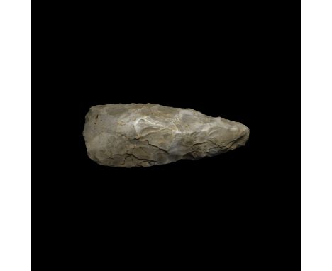 Neolithic, 7th-4th millennium BP. A finely knapped axe with polished cutting edge of lentoid section with edges tapering from