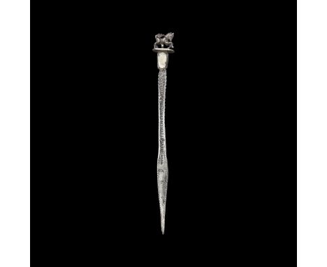 1st-2nd century AD. A silver stylus with square-section upper shank, leaf-shaped lower shank tapering to a fine point, punche