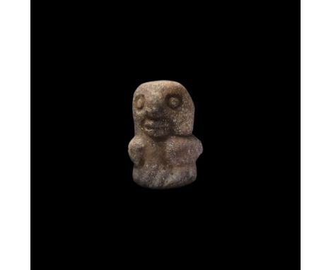 4th century BC. A rhyolite idol with bulbous head and body, low-relief facial features, arms forming a horizontal interrupted