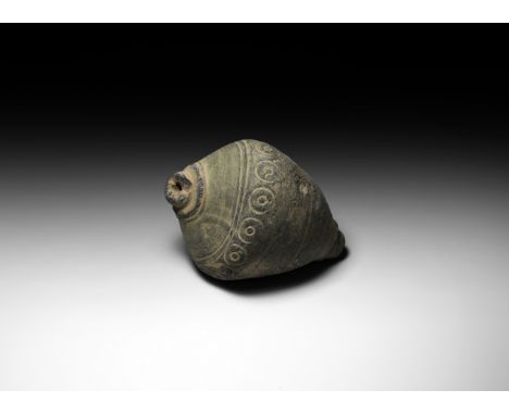 9th-11th century AD. A ceramic bulbous vessel with domed top and flat base, intended to be filled with explosive liquid and w