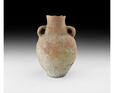 3rd-2nd millennium BC. A ceramic vessel with bulbous body, short neck and flat base, loop handles to the shoulders.   877 gra