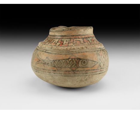 4th-3rd millennium BC. A squat bulbous ceramic pot with broad neck and raised collar, band of painted geometric panels to the