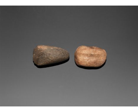 Neolithic, 3rd-2nd millennium BC. A group comprising: small ground stone axe with polished convex cutting edge tapering to ro