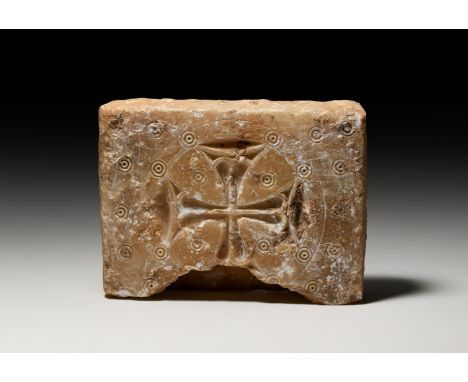 6th-8th century AD. A rectangular carved marble architectural panel with slot to the underside, incised Maltese cross within 