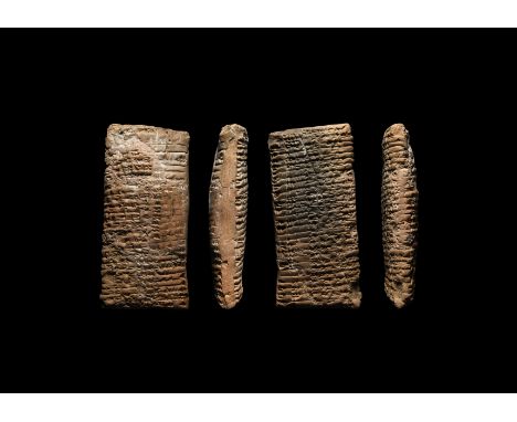 1900-1600 BC. A large ceramic pillow-shaped cuneiform tablet containing administrative matters; accompanied by a copy of a ha