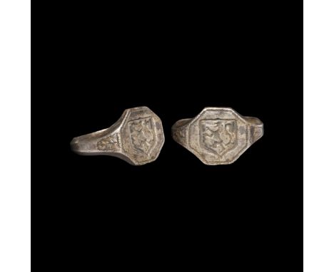 Late 16th-early 17th century AD. A late Tudor or early Stuart silver signet ring with facetted hoop and octagonal bezel, a to