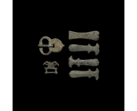 10th century AD. A set of silver Avar belt fittings comprising: buckle with discoid plaque, broad loop, stud to the tongue; t