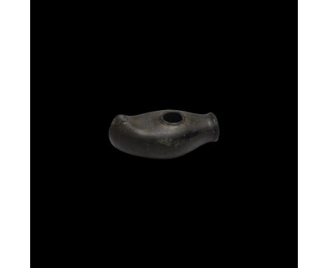 Neolithic, 3rd-2nd millennium BC. A finely polished battle axe in grey-green stone with asymmetric convex cutting edge curvin