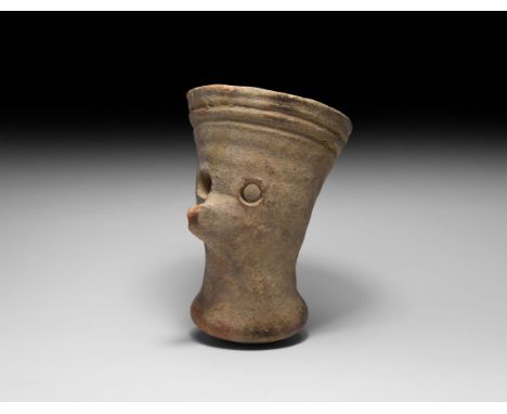 3rd millennium BC. A ceramic funnel for a ritual vessel(?) comprising a rounded underside, flared lower body and conical uppe