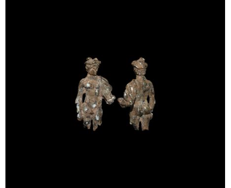 1st-3rd century AD. A silver statuette of Mercury (Greek Hermes) wearing a pilos hat with wings, head turned to the left; nak