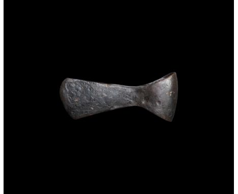 9th-11th century AD. An iron axe with narrow triangular-section curved blade, round socket with extension to the rear.   446 